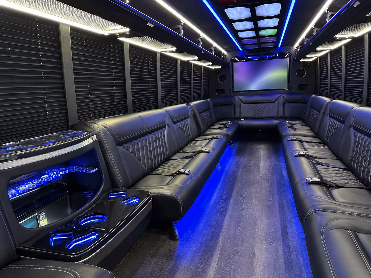 orange 20 passenger party bus inside
